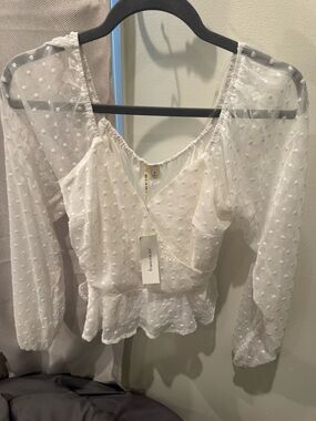 Francesca's Collections White Sheer Swiss Dot Peplum Wrap Blouse